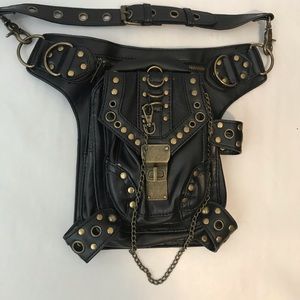 Black studded with chain accents Sling bag